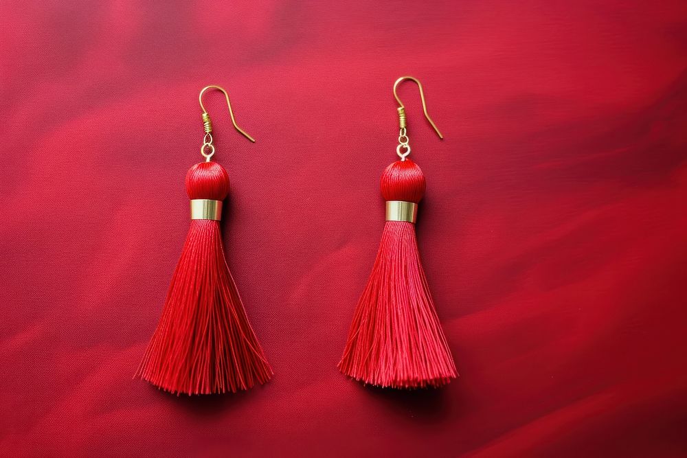 Red Tassel Earrings earring jewelry red. AI generated Image by rawpixel.