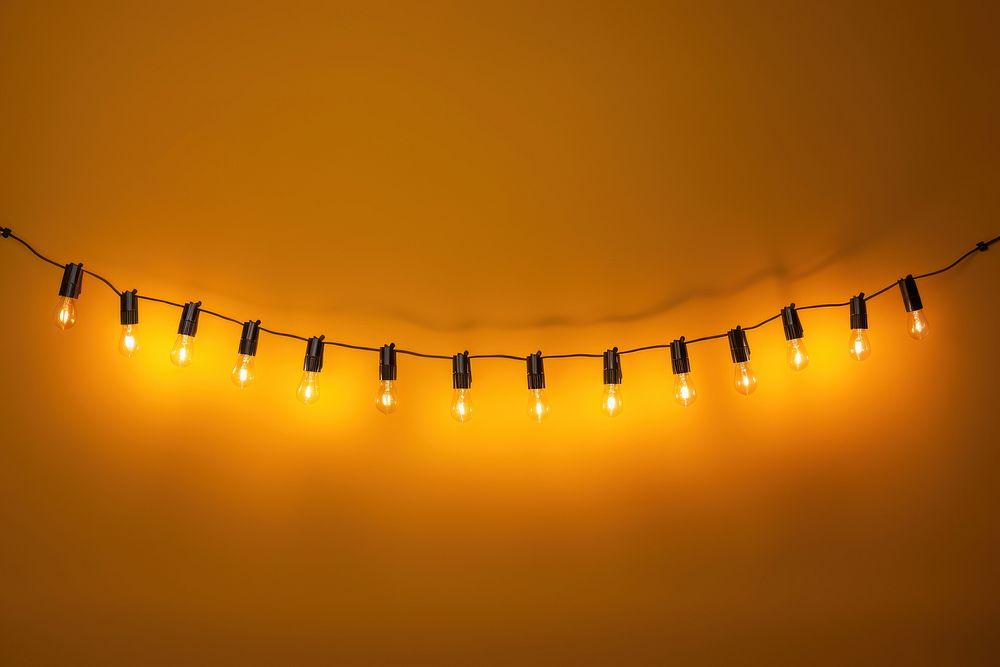 String lights chandelier lighting yellow. | Premium Photo - rawpixel