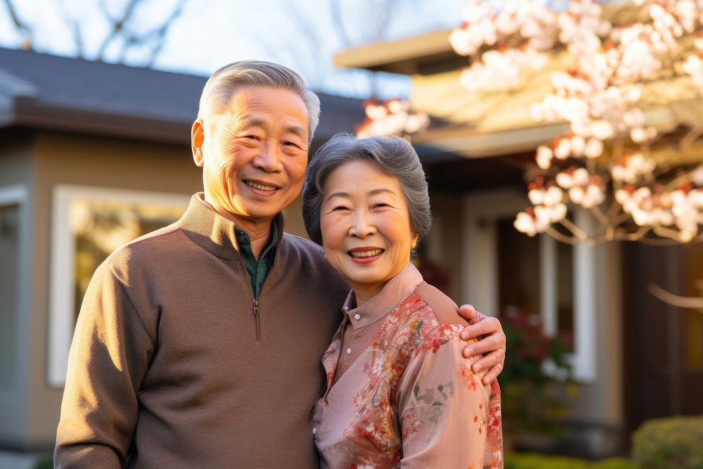 Old asian couple portrait outdoors smiling. AI generated Image by rawpixel.