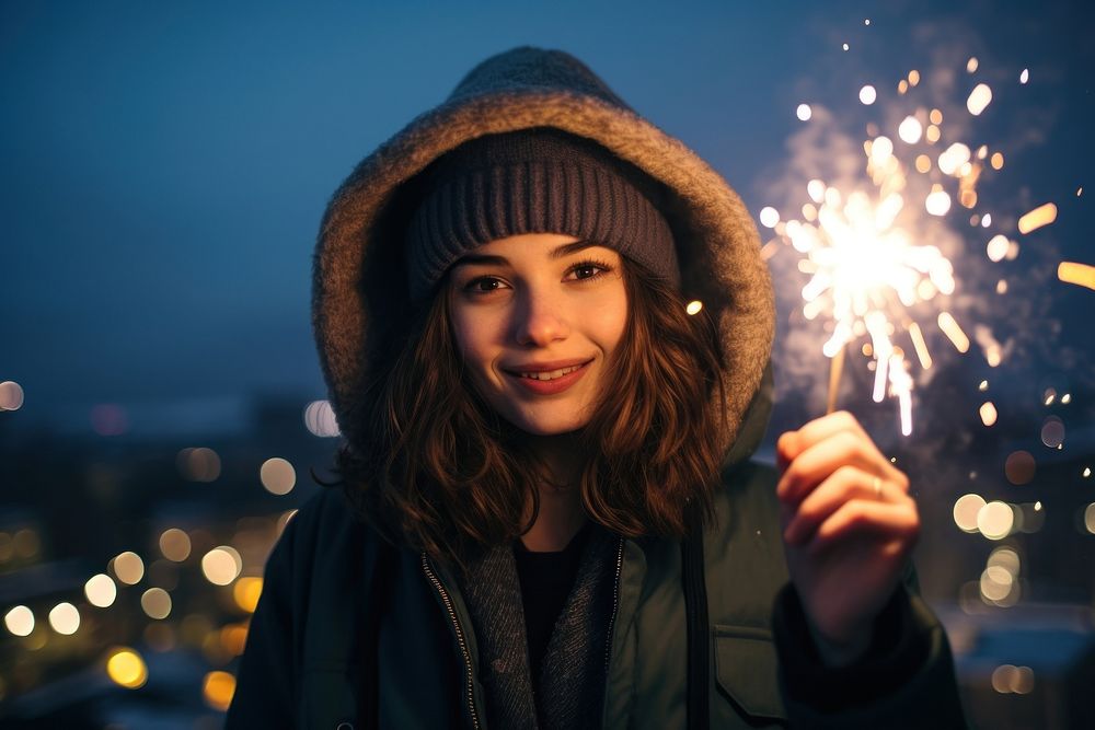 Christmas celebrations fireworks portrait holding. AI generated Image by rawpixel.