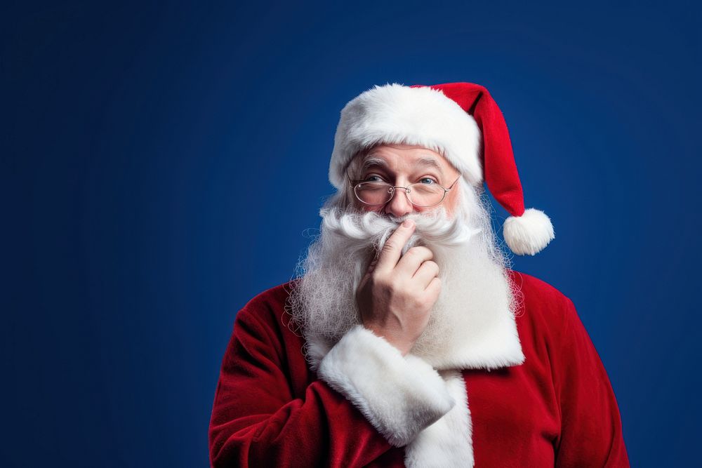 Santa claus being quiet christmas blue celebration. AI generated Image by rawpixel.