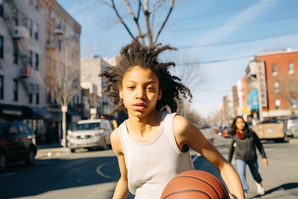 Young girl playing basketball. AI generated Image by rawpixel.