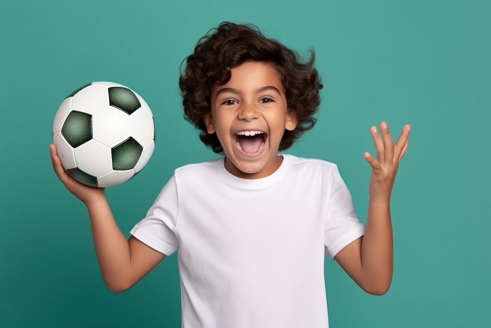 Football sports child happy. AI generated Image by rawpixel.