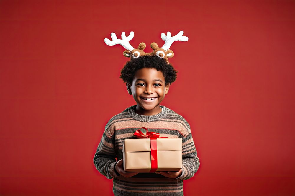African american boy christmas sweater holiday. AI generated Image by rawpixel.