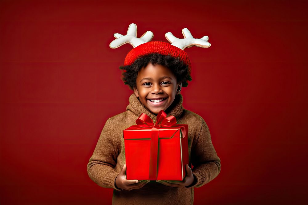 African american boy christmas holiday gift. AI generated Image by rawpixel.