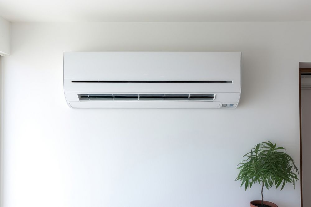 Close up of White air conditioning on the clean white wall architecture technology appliance. AI generated Image by rawpixel.