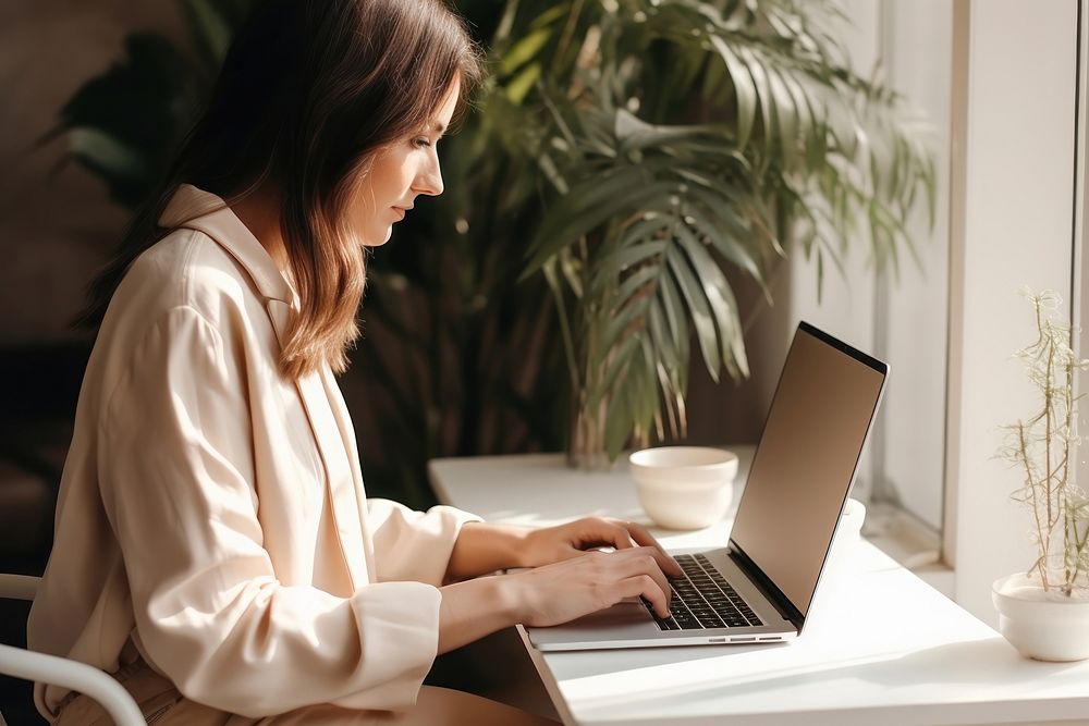 Laptop computer sitting table. AI | Premium Photo - rawpixel