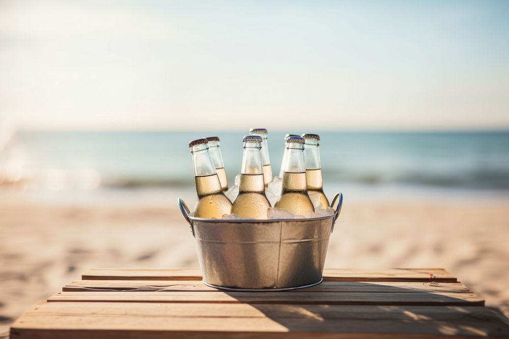Bottles outdoors beach table. AI generated Image by rawpixel.