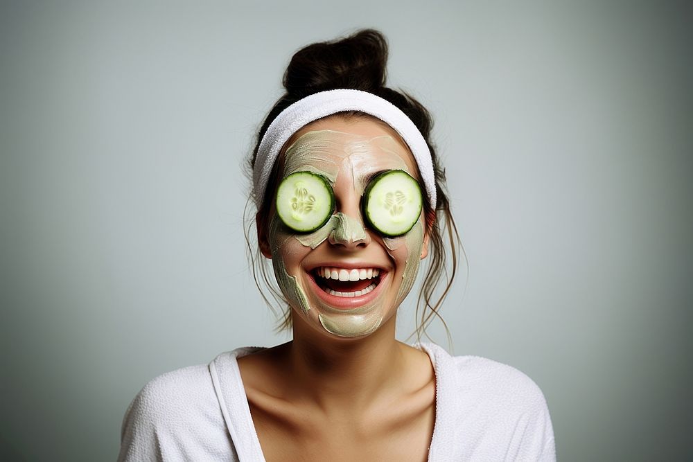 Woman has cucumber slice cover eye portrait smile adult. AI generated Image by rawpixel.