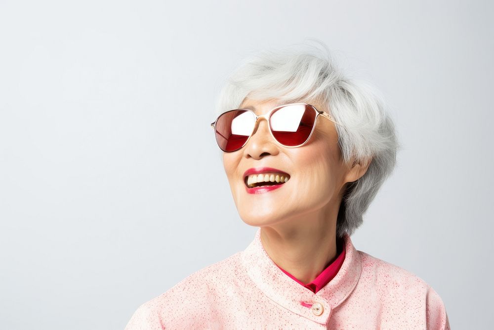 Senior asian woman sunglasses portrait laughing. AI generated Image by rawpixel.