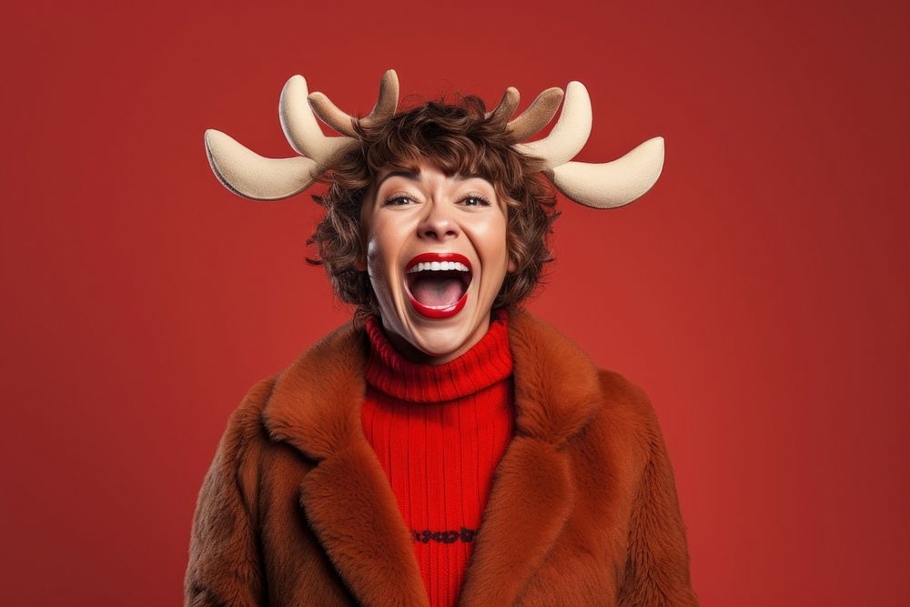 Reindeer shouting laughing sweater. AI generated Image by rawpixel.