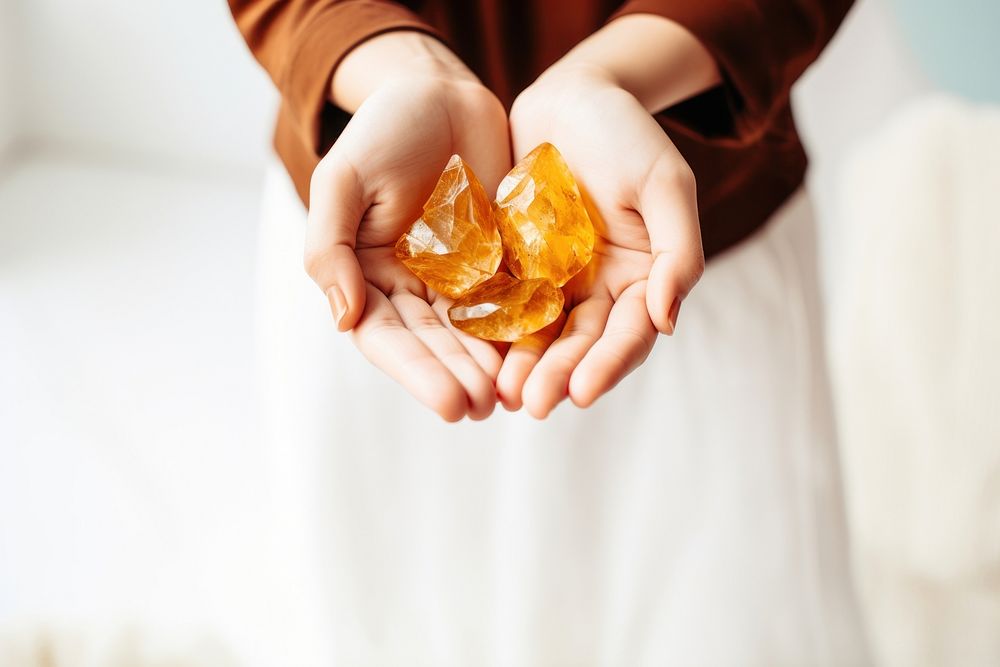Citrine hand food freshness. AI generated Image by rawpixel.