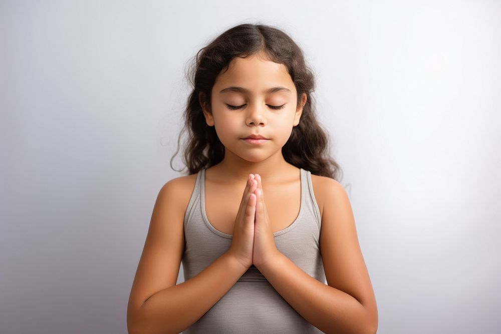 Girl doing Anjali Mudra pose yoga contemplation spirituality. AI generated Image by rawpixel.
