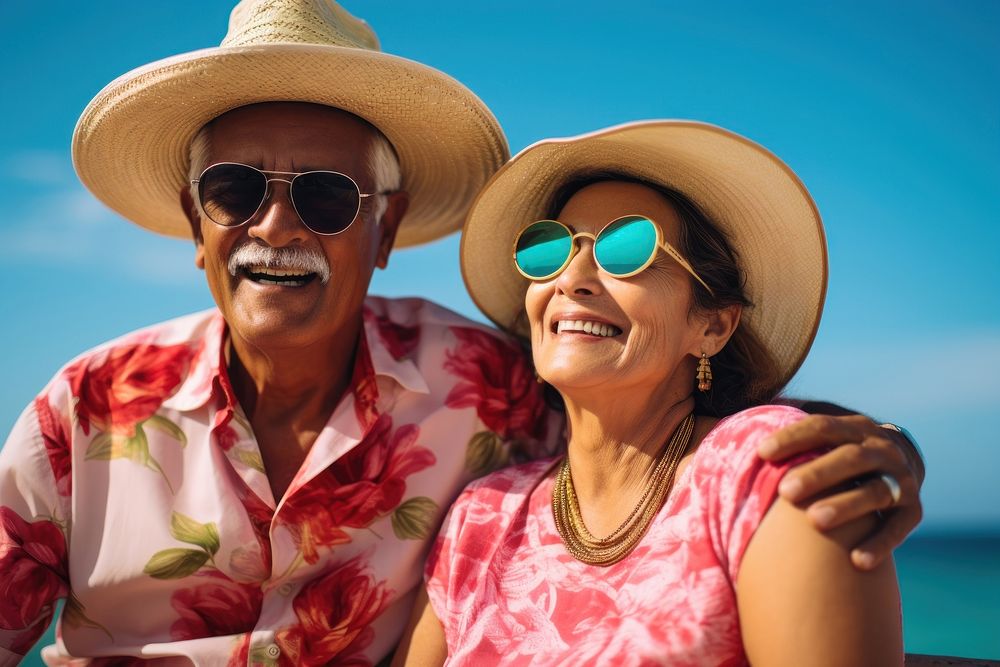 Mature Mexican couple sunglasses laughing vacation. AI generated Image by rawpixel.
