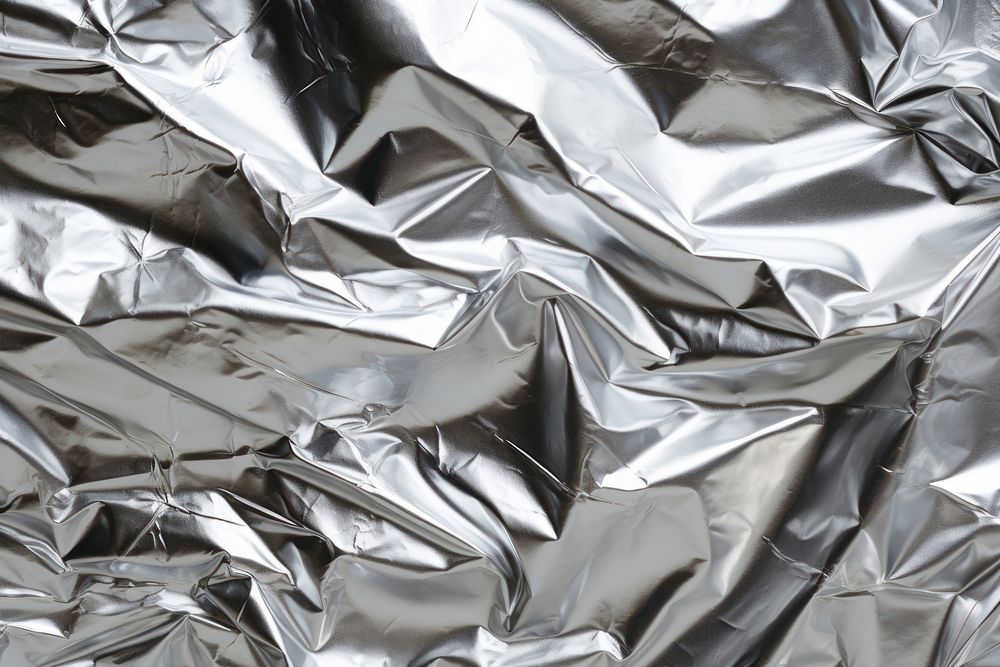 Aluminum foil texture backgrounds aluminium crumpled. AI generated Image by rawpixel.