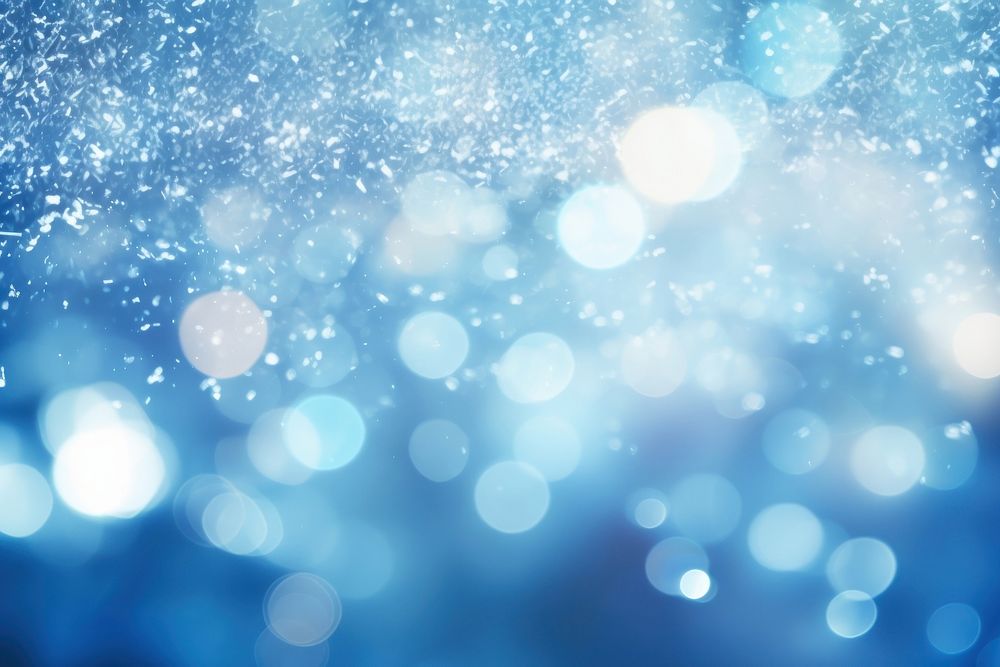 Chirstmas blue light flare backgrounds glitter illuminated. AI generated Image by rawpixel.