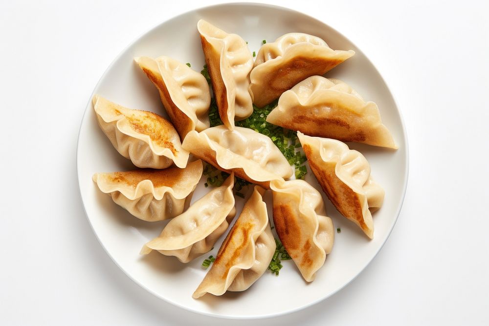 Fried Dumplings dumpling plate food. AI generated Image by rawpixel.