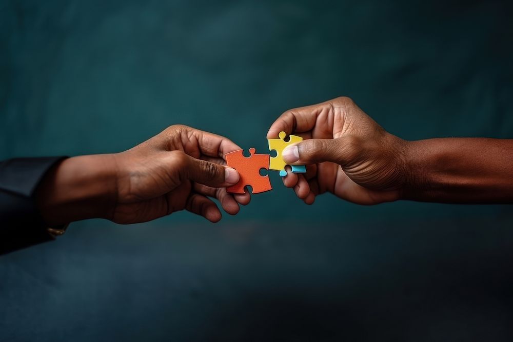 Jigsaw puzzle hand toy togetherness. AI generated Image by rawpixel.