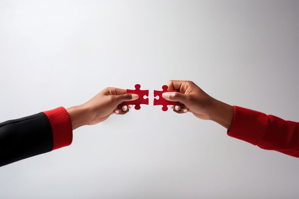 Man hands connecting couple puzzle piece adult jigsaw puzzle togetherness. AI generated Image by rawpixel.