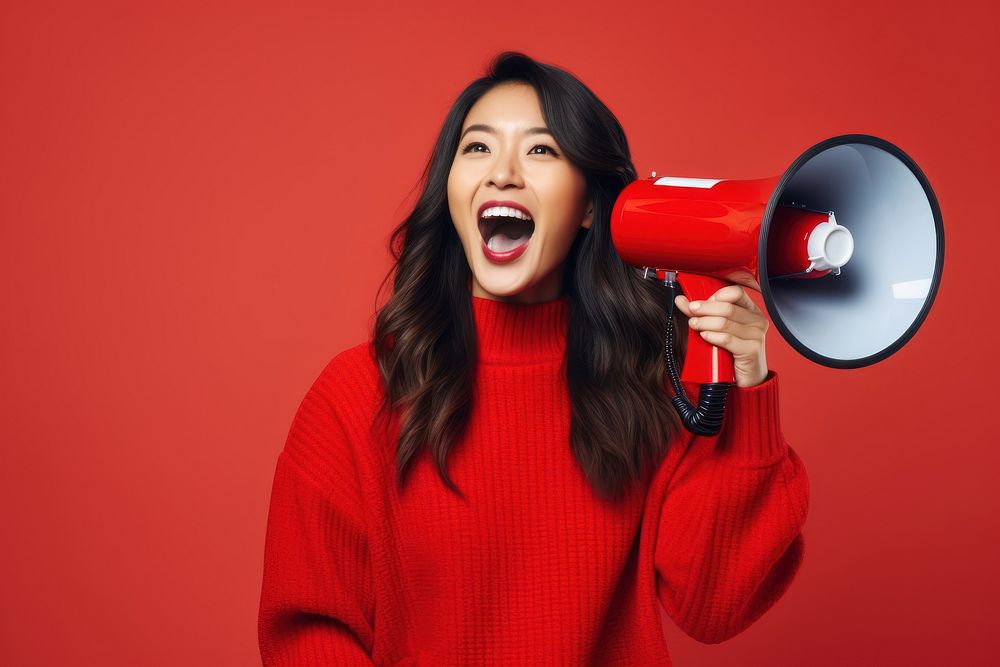 Asian Woman Smiling Megaphone shouting smiling adult. AI generated Image by rawpixel.