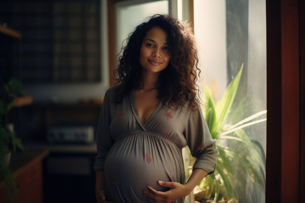 Micronesian pregnant mother portrait adult photo. AI generated Image by rawpixel.