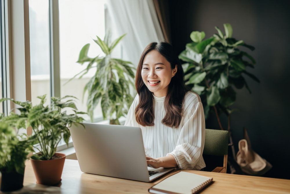 Smiling asian woman laptop computer | Premium Photo - rawpixel