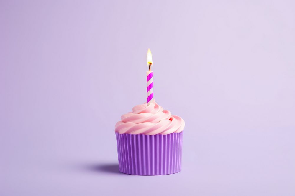 Birthday candle cupcake dessert food. AI generated Image by rawpixel.