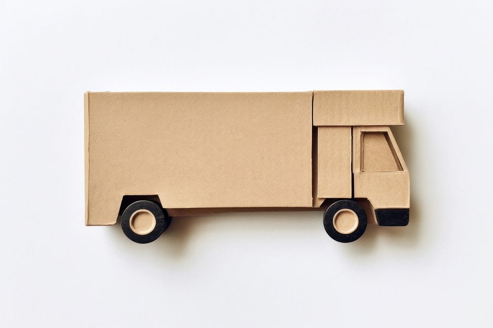Container truck cardboard vehicle wheel. AI generated Image by rawpixel.