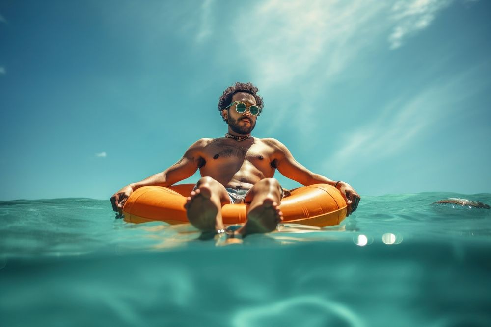 Indian man swimming floating outdoors. AI generated Image by rawpixel.