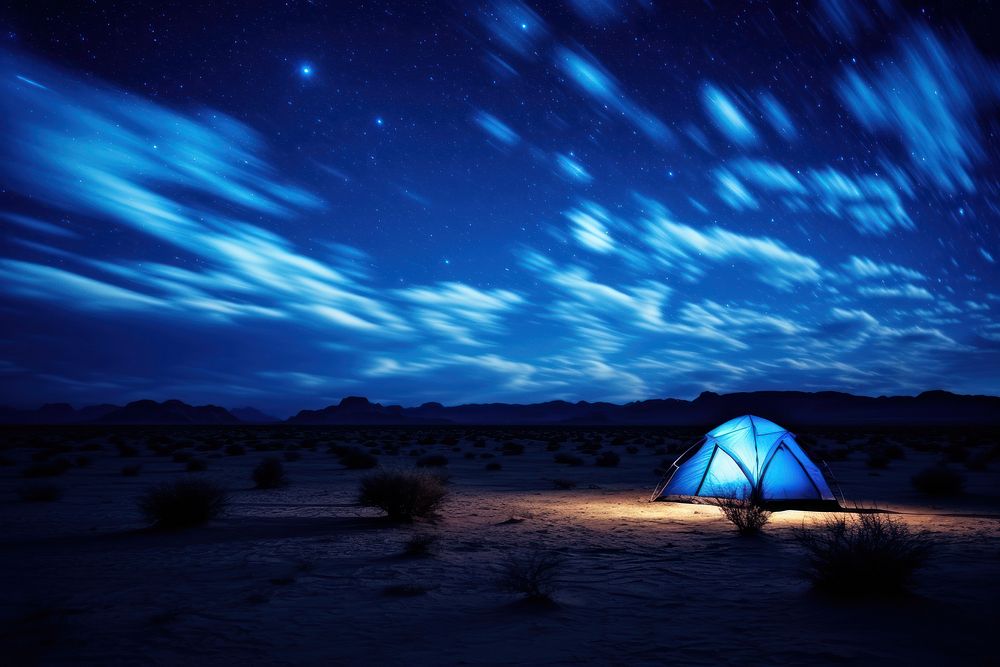 Tent shining blue night tent sky. AI generated Image by rawpixel.