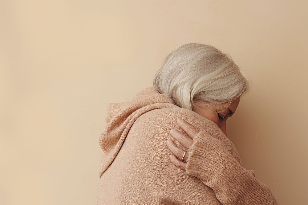 Older woman hugging adult face. AI generated Image by rawpixel.