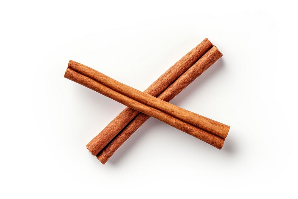 A cinnamon stick food white background freshness. AI generated Image by rawpixel.