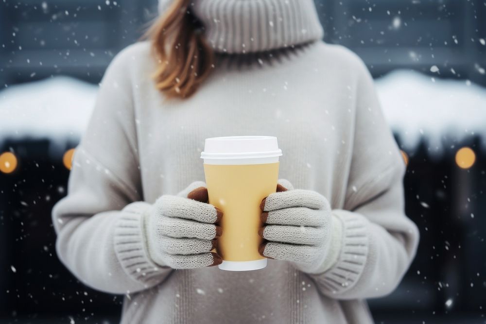 Paper cup holding winter snow. AI generated Image by rawpixel.