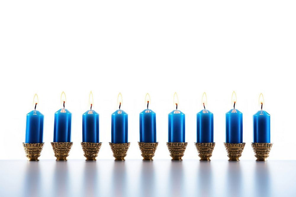 A hanukkah candle white background spirituality. AI generated Image by rawpixel.