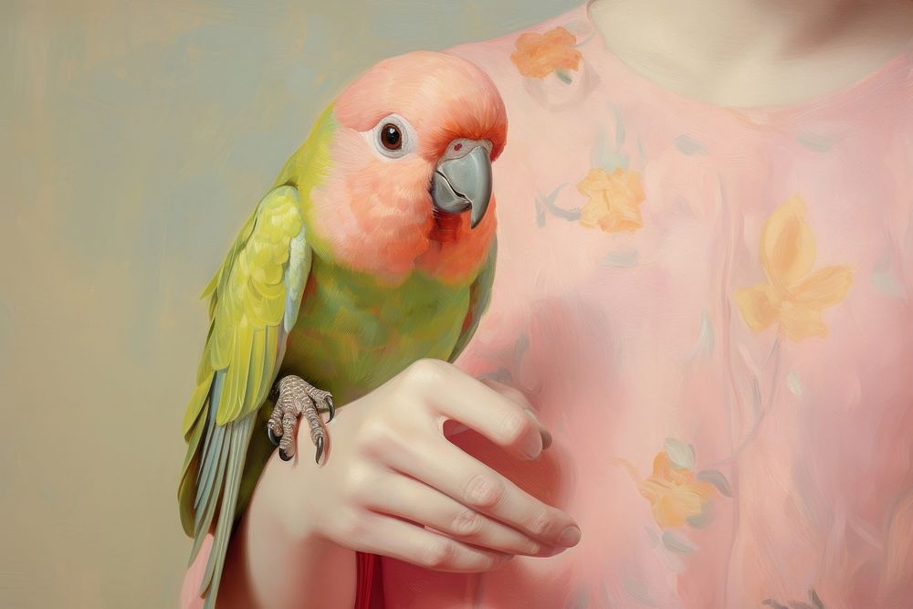 Women hand holding a small pink parrot painting animal bird