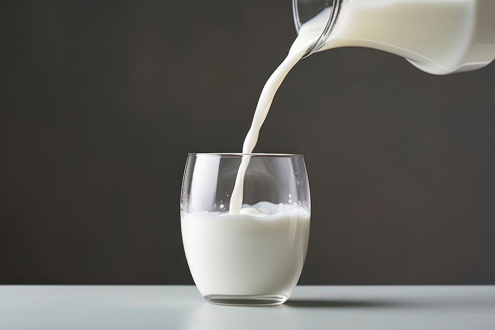 Milk pouring dairy drink. AI generated Image by rawpixel.