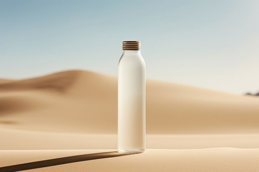 Bottle product nature sand day. AI generated Image by rawpixel.