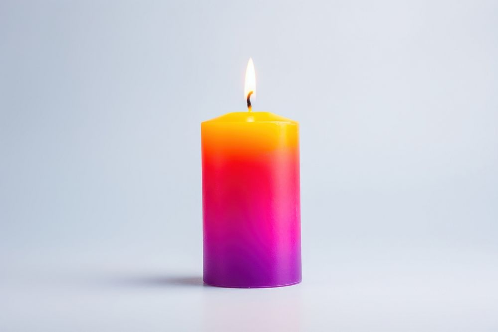 Color candle fire white background spirituality. AI generated Image by rawpixel.