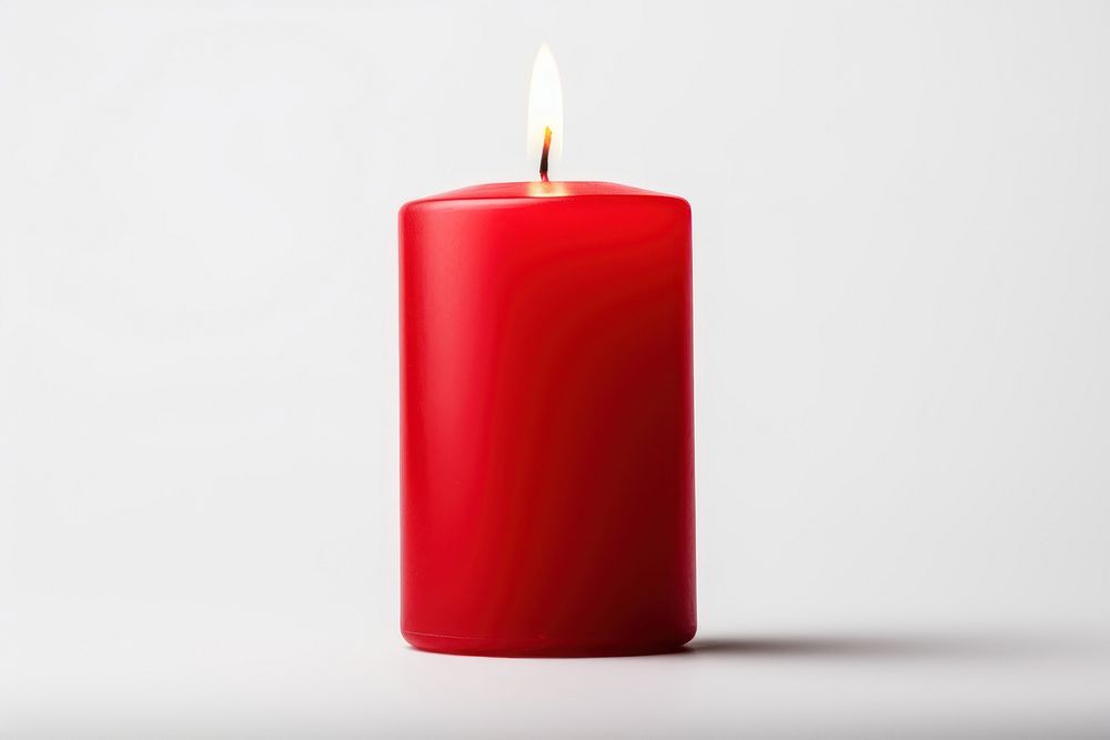 Red candle white background spirituality illuminated. AI generated Image by rawpixel.
