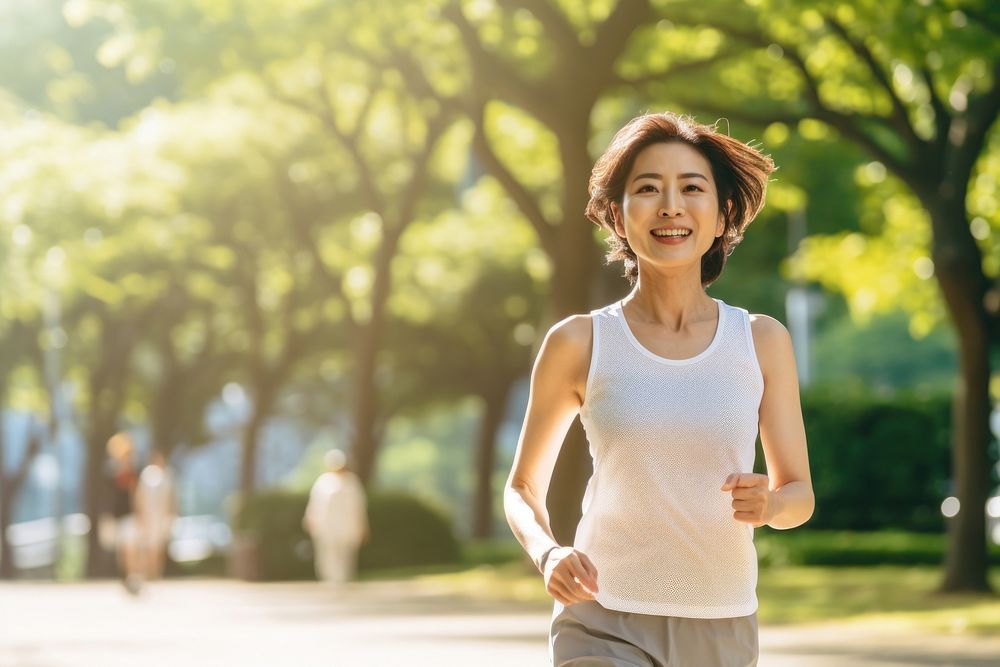 Japanese women jogging running adult. AI generated Image by rawpixel.