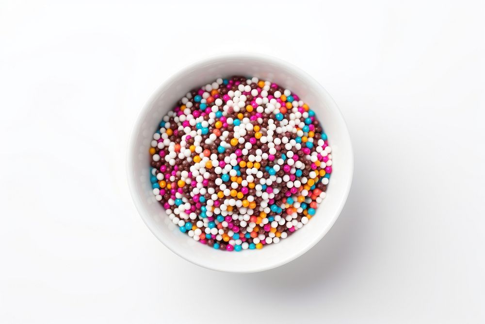 Candy sprinkles bowl white background confectionery. AI generated Image by rawpixel.