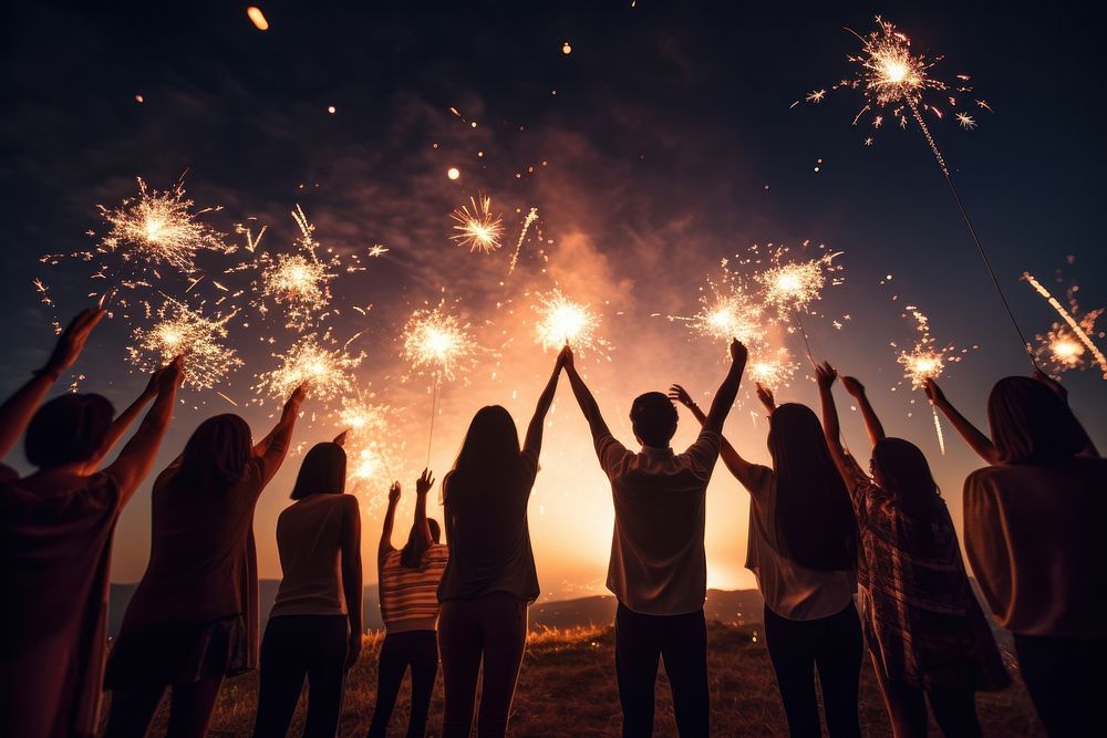 Celebrating holiday fireworks sparkler sparks. AI generated Image by rawpixel.