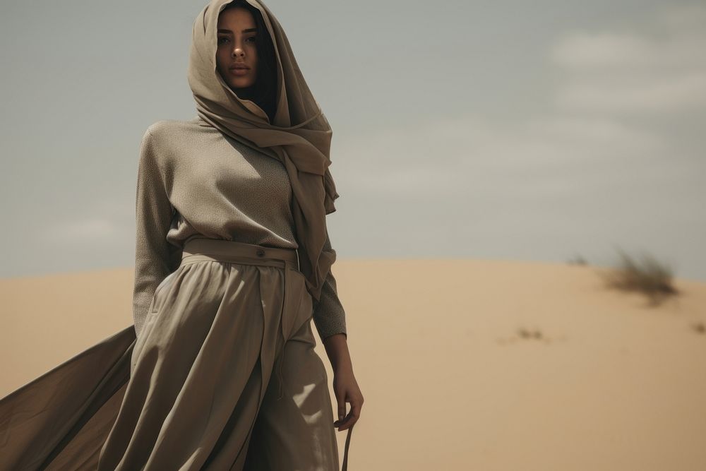 Muslim woman desert outdoors standing. AI generated Image by rawpixel.