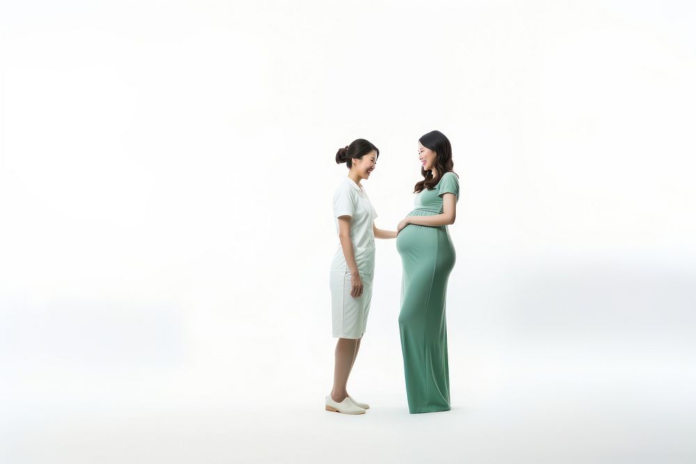A nurse assisting a pregnant woman dress photo white background. AI generated Image by rawpixel.