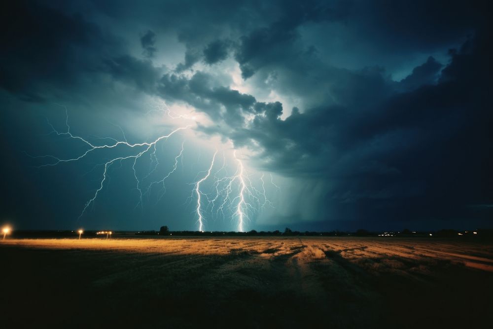 Thunderstorm lightning landscape outdoors. AI generated Image by rawpixel.