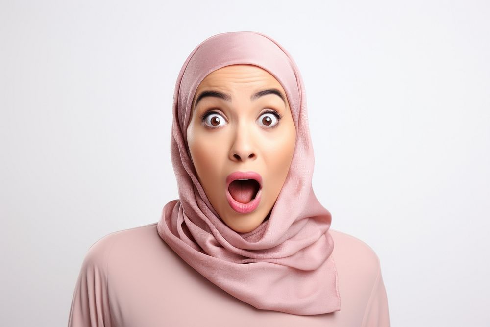 Muslim woman surprised white background gesturing headscarf. AI generated Image by rawpixel.