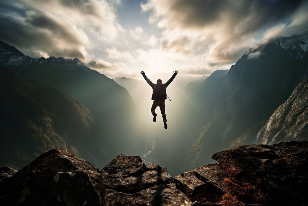 Mountain adventure outdoors jumping. AI generated Image by rawpixel.