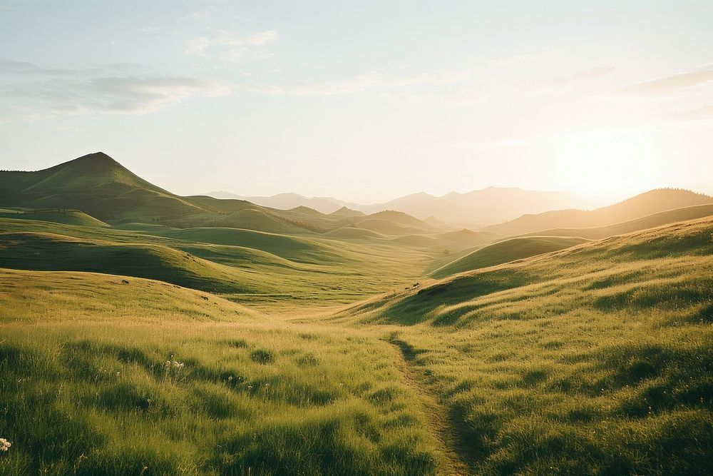Grass hills landscape grassland outdoors. AI generated Image by rawpixel.