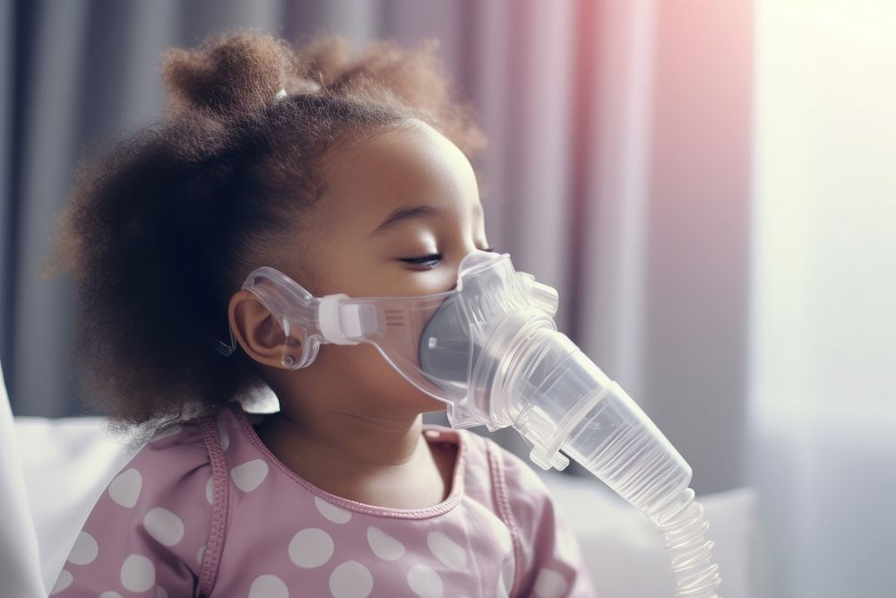 African baby girl use nebulizer mask child hairstyle innocence. AI generated Image by rawpixel.