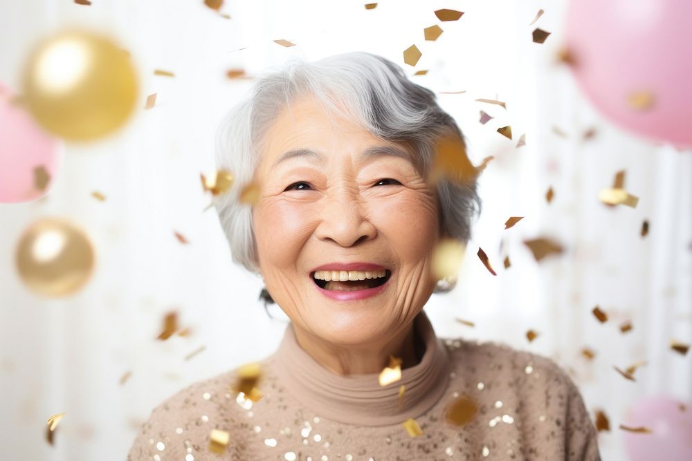 Senior asian woman confetti portrait laughing. AI generated Image by rawpixel.